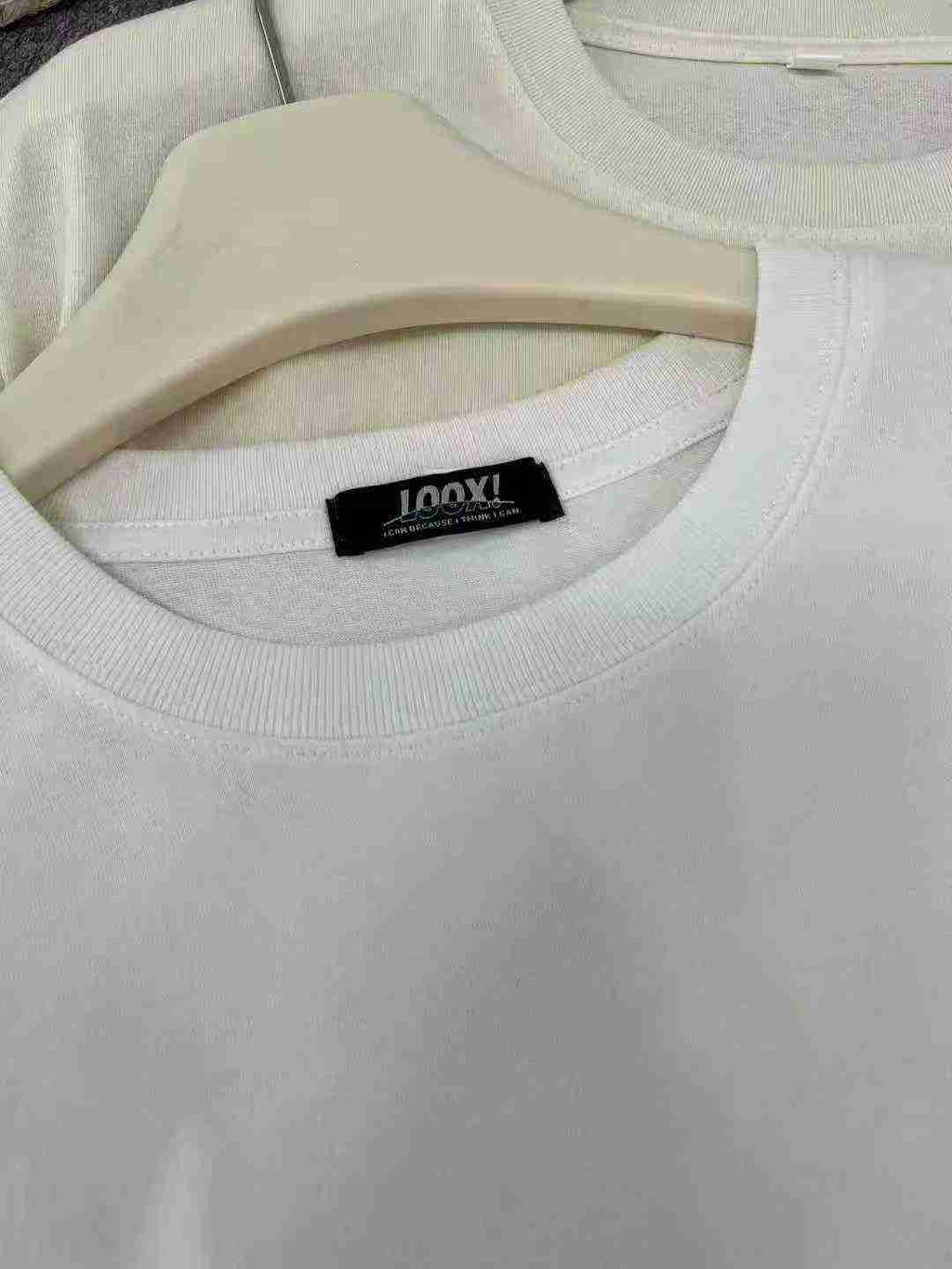 Men's light-colored T-shirt