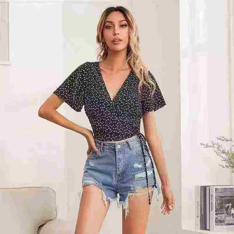 Women's dotted V-neck blouse