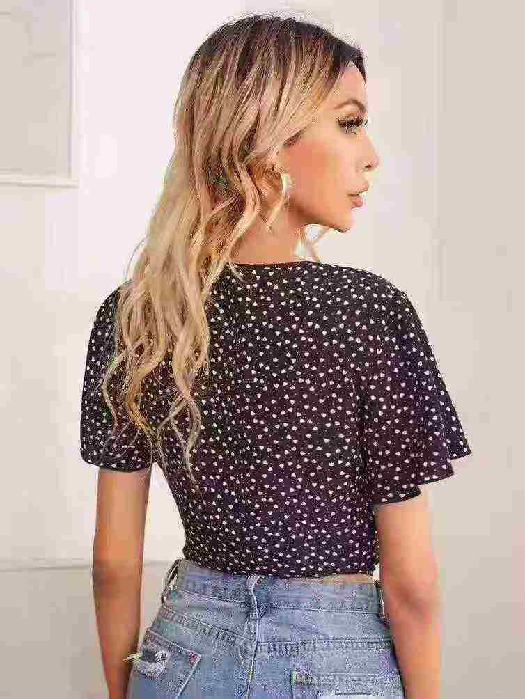 Women's dotted V-neck blouse