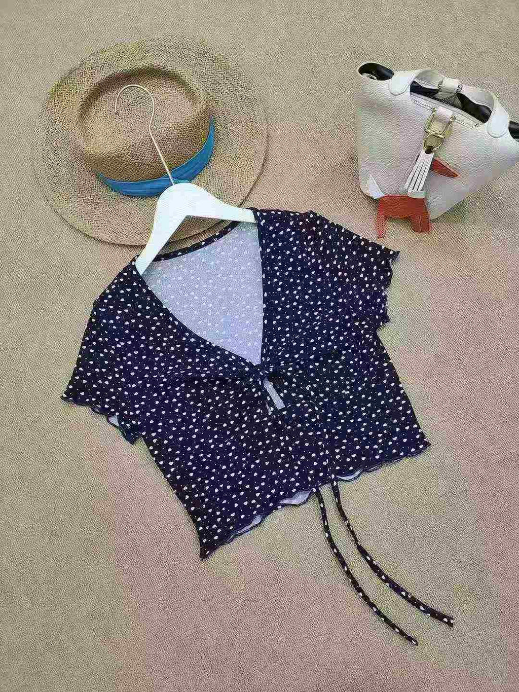 Women's dotted V-neck blouse