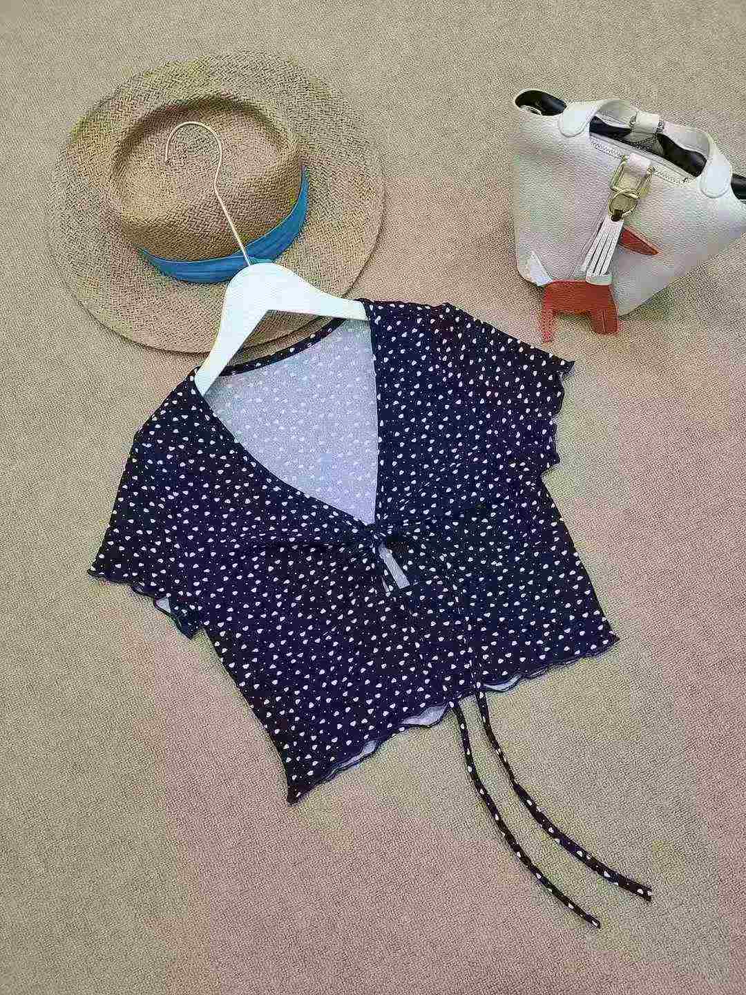 Women's dotted V-neck blouse