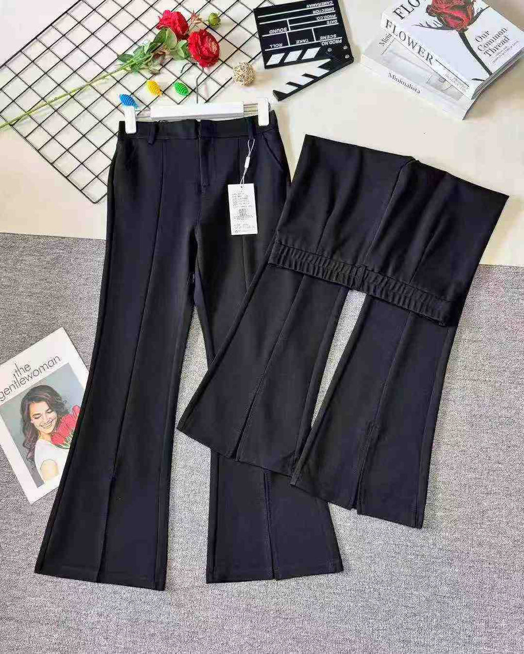 Women's high-waisted stretch black suit with slit and flared legs