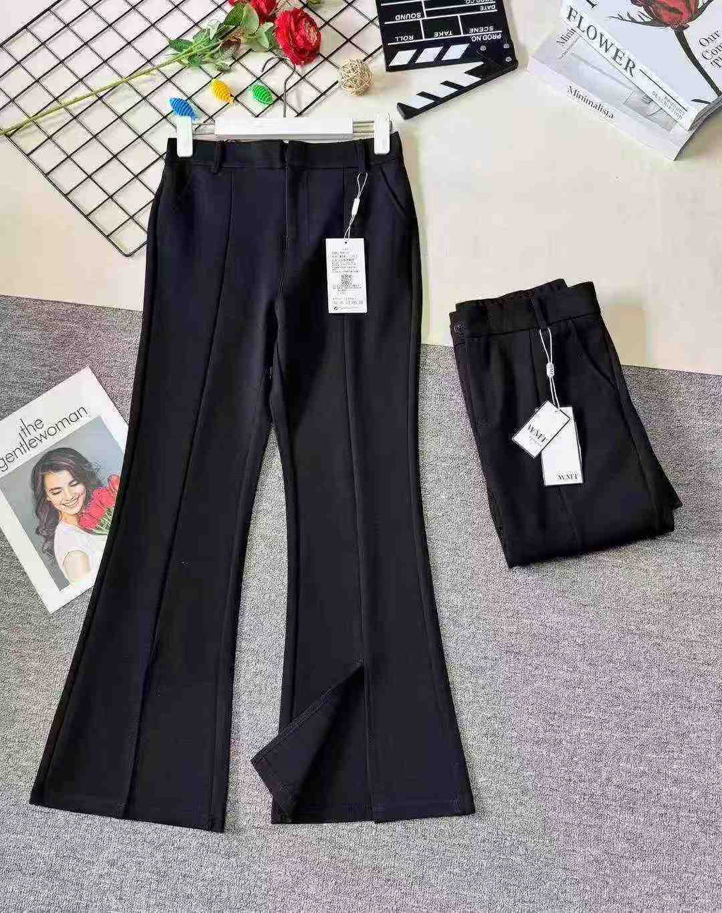 Women's high-waisted stretch black suit with slit and flared legs