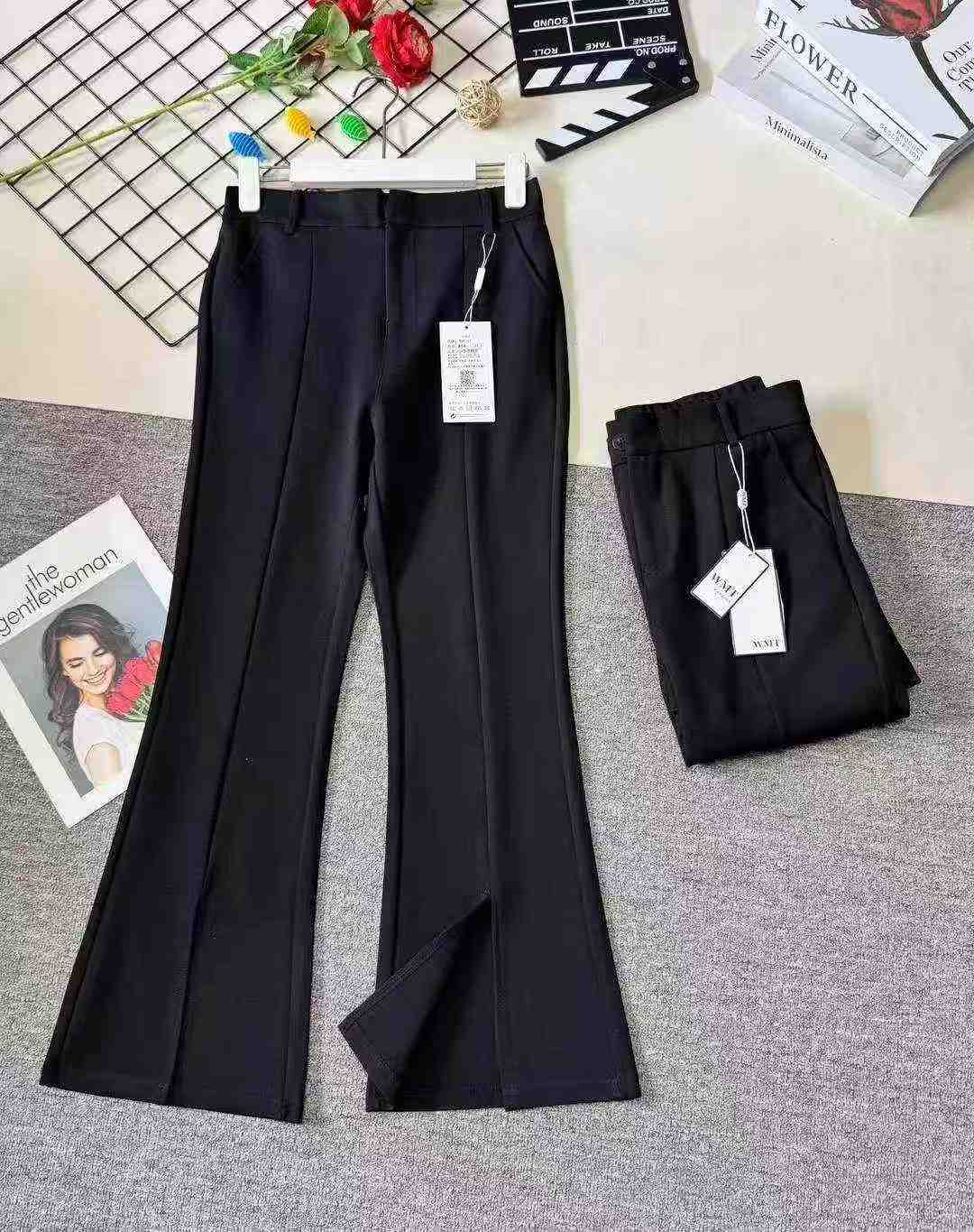 Women's high-waisted stretch black suit with slit and flared legs