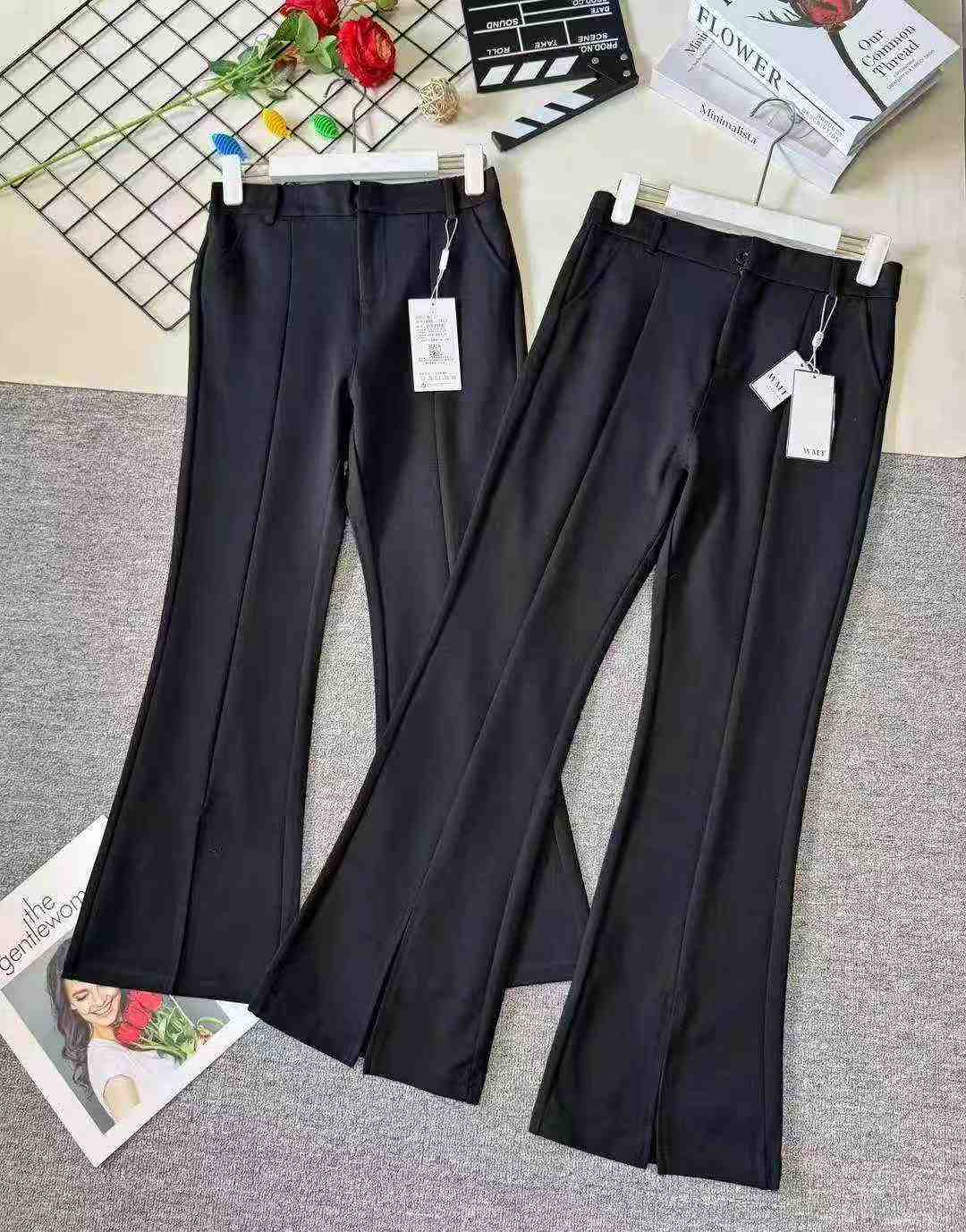 Women's high-waisted stretch black suit with slit and flared legs