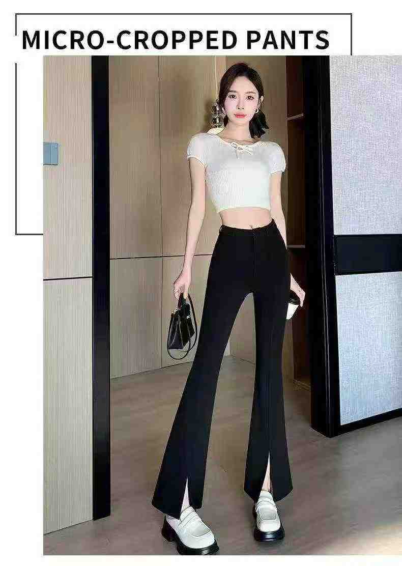 Women's high-waisted stretch black suit with slit and flared legs