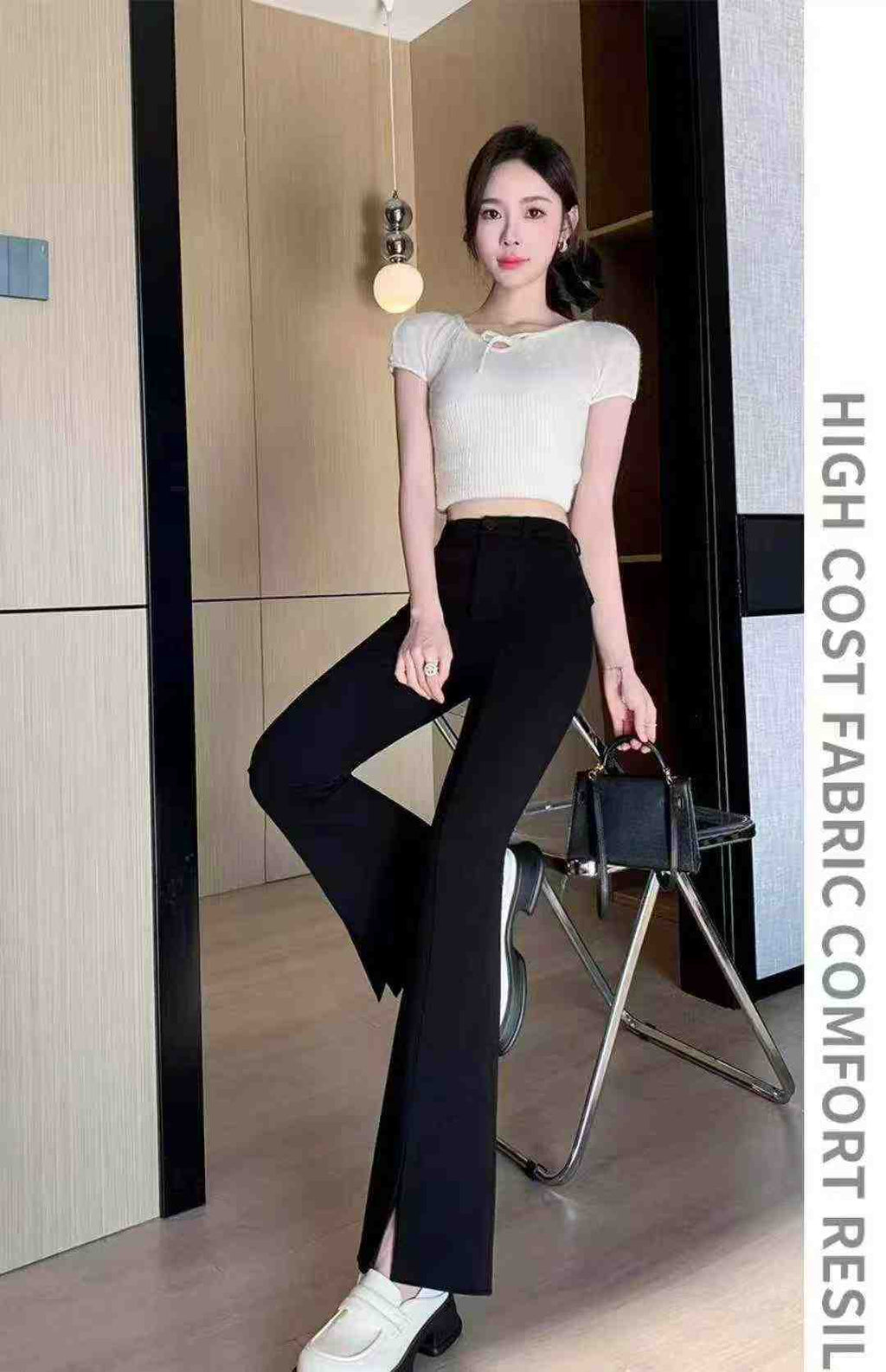 Women's high-waisted stretch black suit with slit and flared legs