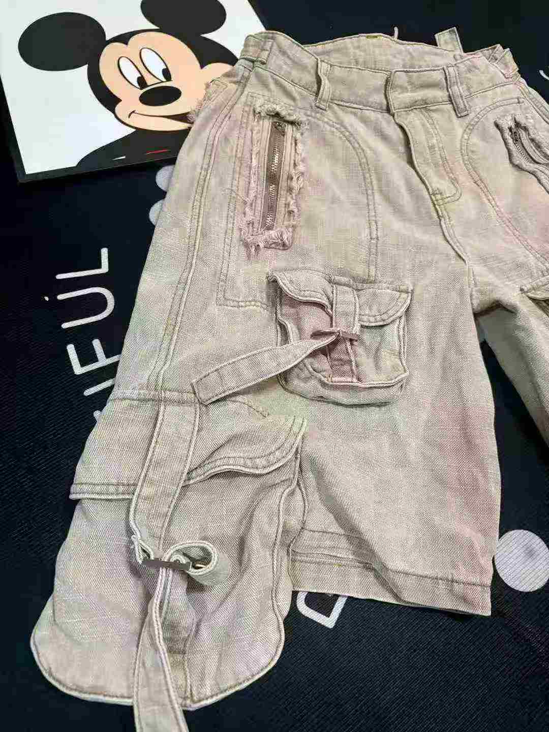 Women's worker wearing five-inch short forestry work pants