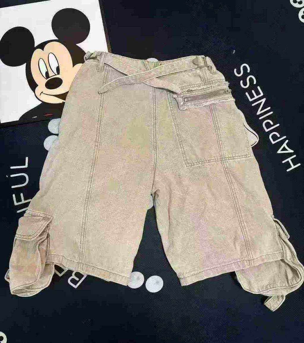 Women's worker wearing five-inch short forestry work pants