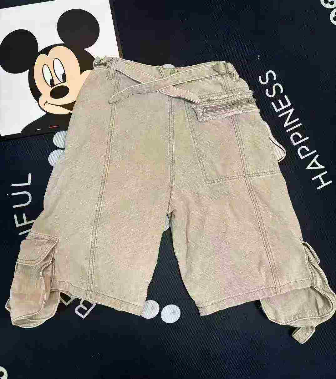 Women's worker wearing five-inch short forestry work pants