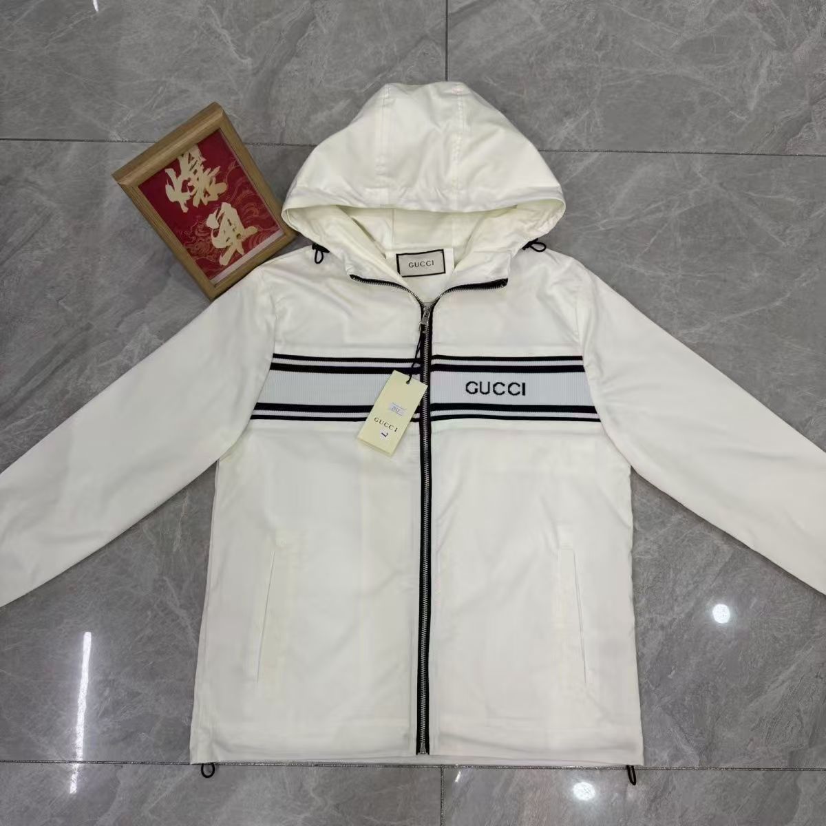 man's coat with a hat